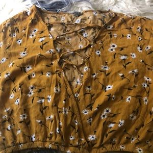 Mustard top with white flower designs